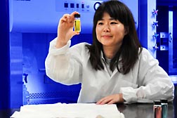 Chemist Sunghyun Nam examines suspensions of silver nanoparticles: Click here for full photo caption.