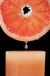 ARS scientists are using mass spectrometry of red grapefruit juice to determine differences in fruit grown conventionally versus organically: Click here for photo caption.