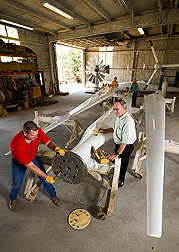 Renewable-energy team members prepare experimental wind turbine blades for atmospheric testing: Click here for full photo caption.