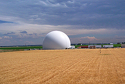 This dome is a weather facility at Greeley, Colorado, one of many stations that gather multiple years of climate data used in combination with a model to project future crop yields in response to various climate changes: Click here for photo caption.
