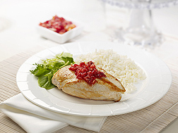Garnishing chicken with cranberry chutney adds flavor and nutrients: Click here for full photo caption.