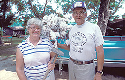 Cotton farmer and his wife: Click here for full photo caption.