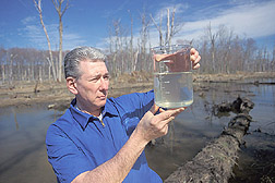 Parasitologist leads a project to determine sources of Cryptosporidium in surface waters: Click here for full photo caption.