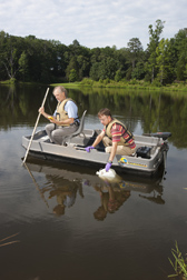 Agricultural Research Service scientists collect water samples in a pond in Watkinsville, Georgia: Click here for full photo caption.