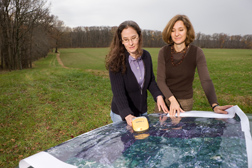 Scientists study a satellite image in efforts to promote the Chesapeake Bay’s health: Click here for photo caption.
