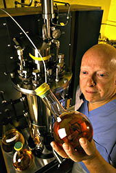 Chemist Albert Baetz monitors a bioreactor for growth of L. monocytogenes. 