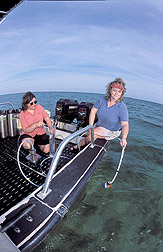 Two chemists collect water samples from Biscayne Bay: Click here for full photo caption.