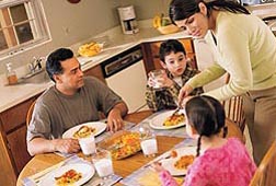Proactive actions, such as creating a home environment where kids are likely to see and be served fruits and vegetables and to see a parent enjoying eating fruits and vegetables, are believed to be more effective ways to get children to eat these healthful foods: Click here for photo caption.