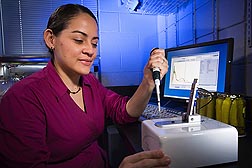 Microbiologist Ilenys Pérez-Díaz is part of an ARS team that has developed new technology that replaces as much as 80 percent of the sodium chloride in brining liquid with calcium chloride.