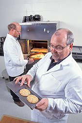 Two food technologists bake cookies for tests: Click here for full photo caption.
