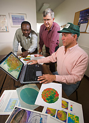 Colorado State University horticulturist, extension agent, and soil scientist discuss use of the NLEAP computer model and GIS: Click here for full photo caption. 