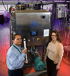 Chemical engineers examine a ceramic membrane module for use in microfiltration of liquid egg whites to eliminate potential pathogens such as Salmonella enteritidis: Click here for full photo caption.