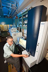Chemist Neil Price analyzes sugars using a mass spectrometer to investigate which oligosaccharide sugars are present: Click here for full photo caption.