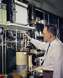 WRRC scientist Ron Buttery, shown here adjusting a gas chromatography apparatus in 1959, was the first to identify the compound primarily responsible for the flavor of aromatic rice: Click here for photo caption.
