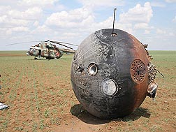 In Kazakhstan, not far from the Russian border, the Foton-M2 capsule is back on Earth after more than 2 weeks in space.