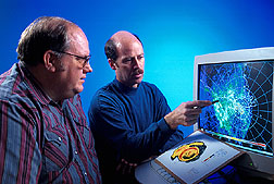Electrical engineer and meteorologist examine clear-air imagery from a NEXRAD Doppler weather radar. Click here for full photo caption.
