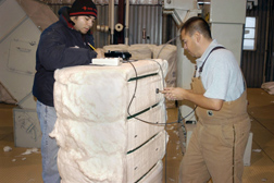 ARS technicians test industry-standard hand-held probes for accuracy: Click here for full photo caption.