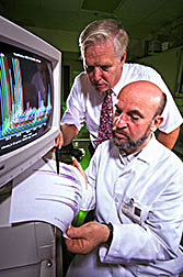 Ronald L. Prior (left) and visiting scientist Emin Sofic evaluate antioxidant components of strawberries. 