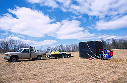 Scientists prepare rainfall simulator for transport: Click here for full photo caption.