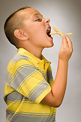 Fried foods raise the energy density of fast-food kids’ meals. As obesity rates rise in the United States, so does the percentage of meals eaten away from home: Click here for photo caption.