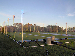 At the University of Minnesota Turf Research, Outreach, and Education Center in St. Paul, Minnesota, a rainfall simulator is used to generate runoff: Click here for full photo caption.
