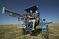 Technician operates a GPS-based electromagnetic induction rig: Click here for full photo caption.