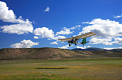 Pilot Joe Nance of Cloud Street Aerial Services, Fort Collins, CO, flies a light sport airplane at 300 feet above ground level as part of a 2008 aerial survey of streamside vegetation in Northeast Nevada: Click here for full photo caption.