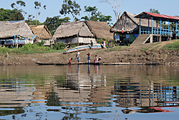 A village on the bank of Rio Pastaza, in Peru: Click here for full photo caption.