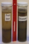 Image of two soil samples filled with water 5cm above soil