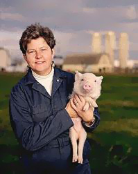 Joan Lunney with piglet
