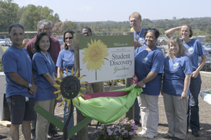 Project volunteers unveil the new garden