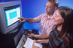 Nutritionist William Horn and chemist Nancy Keim review the study data. Photo: Link to photo information