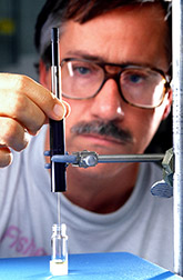Entomologist David Robacker uses a solid-phase microextraction device. Click here for full photo caption.