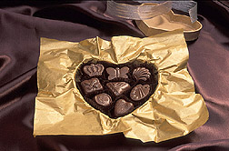 Photo: An open box of chocolates.