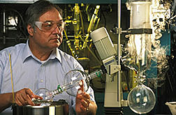 Chemist Albert DeMilo synthesizes a possible insect repellant.