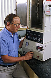 Chemist Robert Maxwell uses supercritical fluid extraction on a tissue sample.