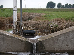 An instrumented water weir used to measure water runoff. Link to photo information