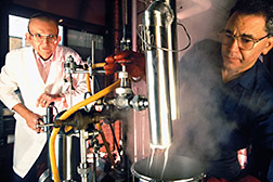 Chemists George Fanta (left) and Kenneth Eskins process starch and oil to make Fantesk.