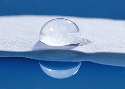 Photo: A new ARS-developed, starch-based coating makes paper water resistant.