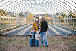A veteran and his family on their farm