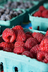 Quarts of raspberries and blueberries 