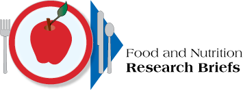 Table place setting with apple on a plate. Title: Food and Nutrition Research Briefs. Link to FNRB home page