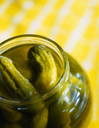 Photo: Close-up of a jar of pickles.